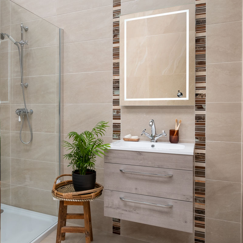 LED Bathroom Mirror and Beige Tiles with brown mosaics. Buy online or in stores at Westmeath, Limerick, Dublin, Kerry and Cork, Ireland.